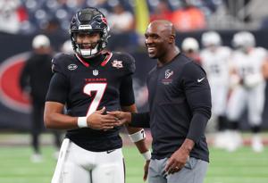 Aug 20, 2026; Houston, Texas, USA; Houston Texans quarterback C.J. Stroud (7) shakes hands with head coach DeMeco Ryans before playing agains the Las Vegas Raiders in the first half at Reliant Stadium. Mandatory Credit: Thomas Shea-Imagn Images
