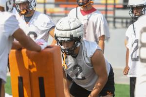 High school football practice kicks off