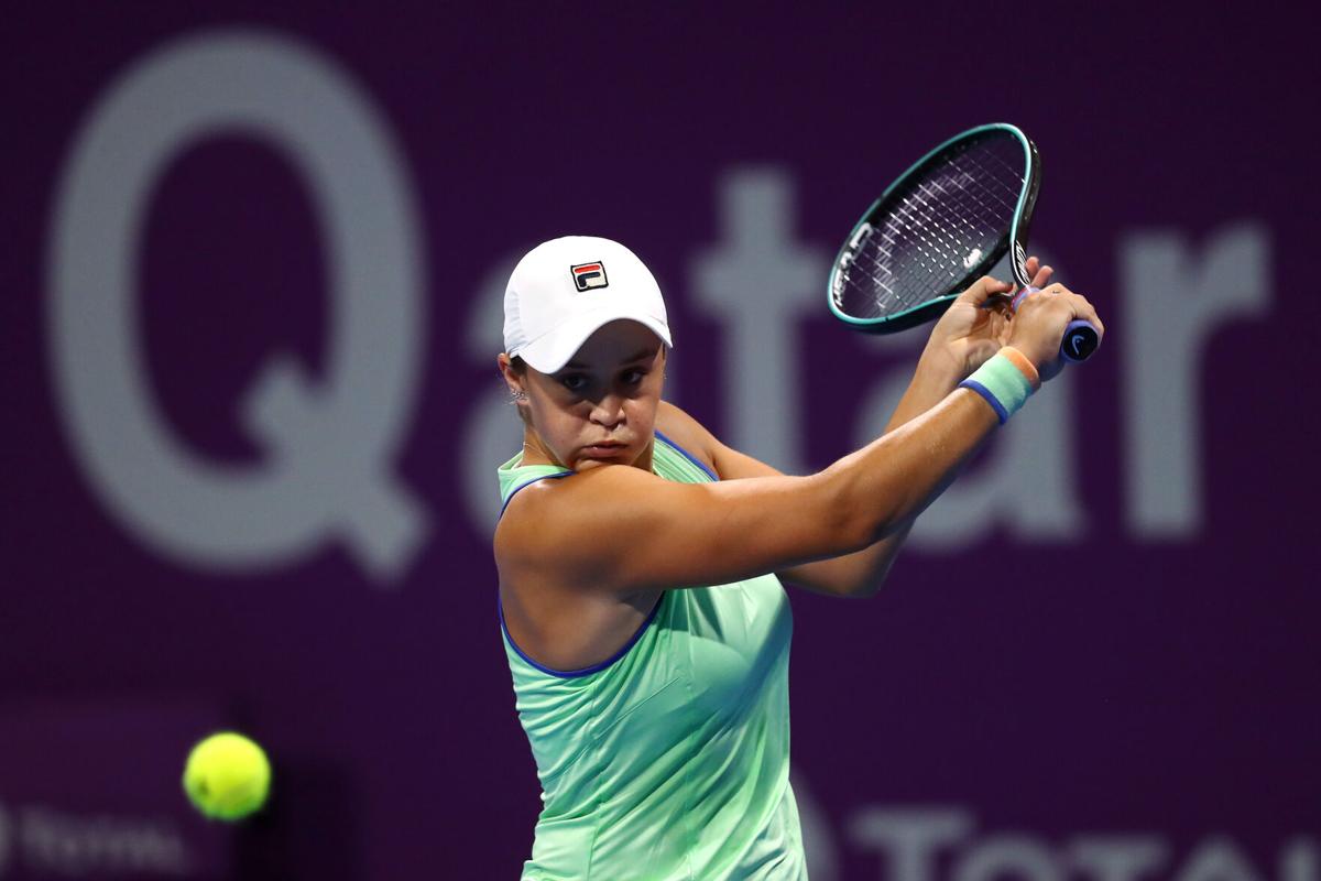 Australia's Ashleigh Barty returns a backhand against Germany's Laura Siegemund during the WTA Qatar Total Open at Khalifa International Tennis and Squash Complex in Doha, Qatar, on February 25, 2020.