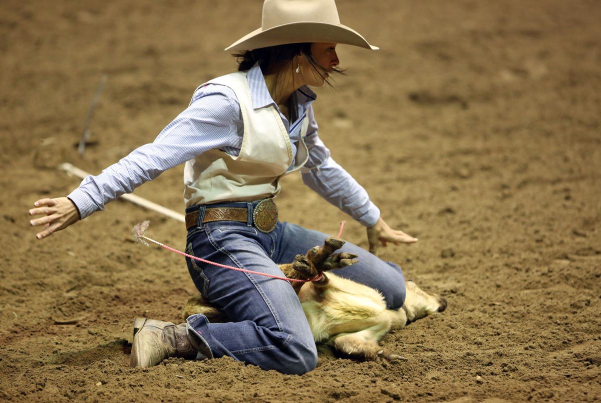 Photos Tuesday slack at the College National Finals Rodeo Rodeo