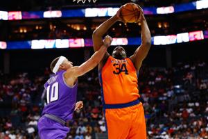 Jul 2, 2017; Charlotte, NC, USA; 3's Company player Michael Sweetney (34) shoots the ball against Ghost Ballers player Mike Bibby (10) at Spectrum Center. Mandatory Credit: Jeremy Brevard-USA TODAY Sports
