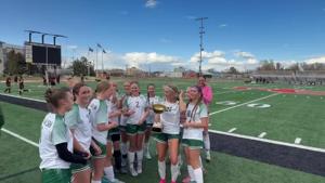 The Kelly Walsh girls celebrate their 2-0 shutout of Natrona County in Tuesday's Casper Cup.
