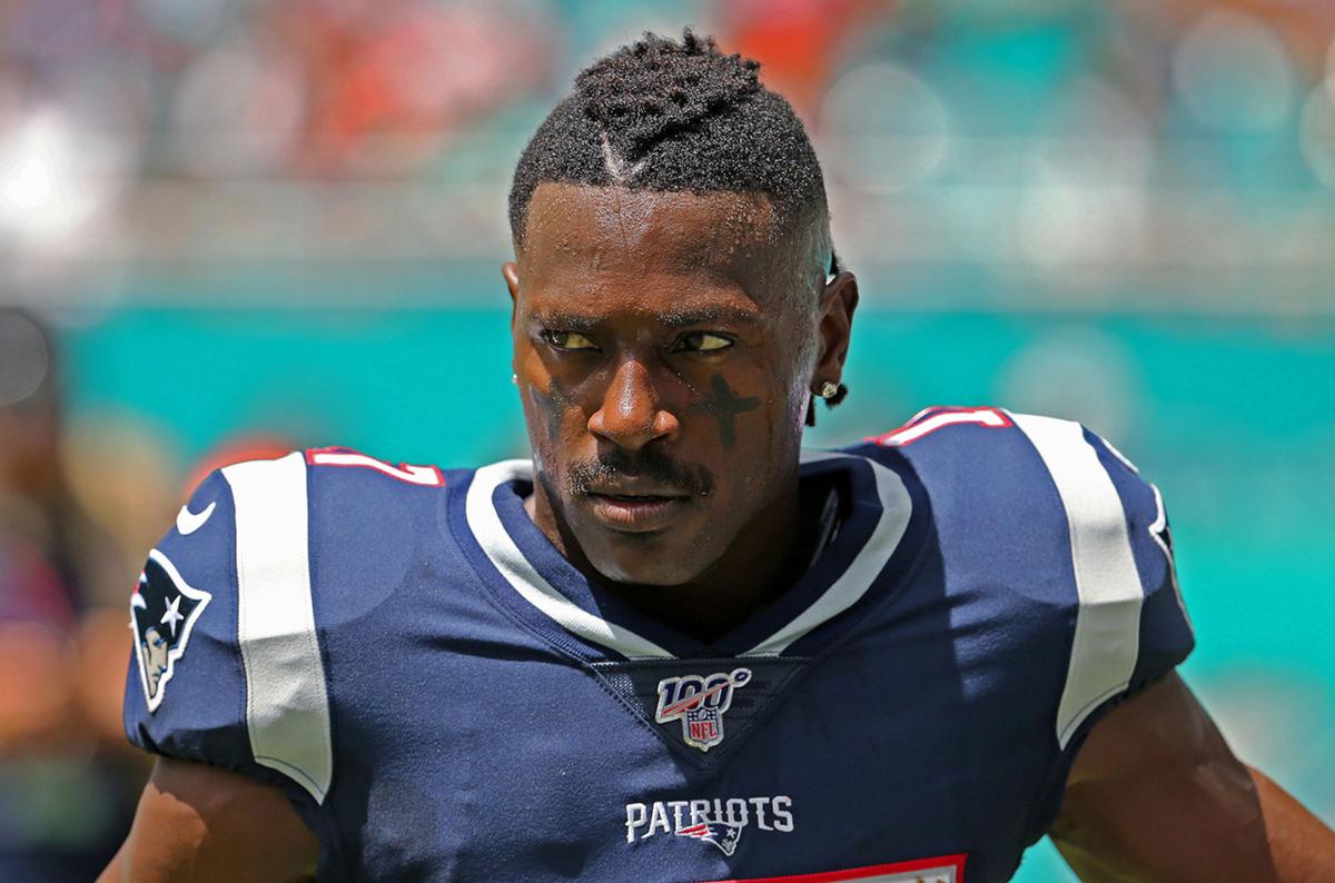 New England Patriots wide receiver Antonio Brown looks on before the start of a game against the Miami Dolphins at Hard Rock Stadium in Miami Gardens, Fla., on Sept. 15, 2019.