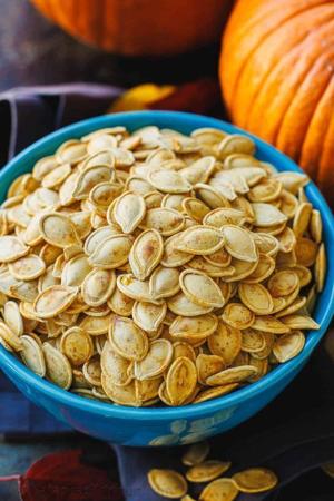Carving jack-o'-lanterns? Don't throw those the seeds away. How to roast them