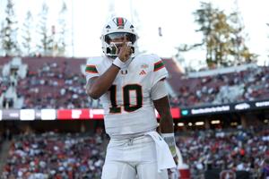 Miami quarterback Darian Mensah celebrates after the Hurricanes scored against Stanford in the first half at Stanford Stadium on Friday, Sept. 4, 2026, in Stanford, California.