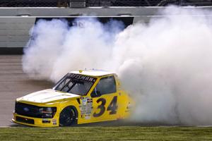 NASCAR Truck Series driver Layne Riggs celebrates winning the Allegiance 200 with a burnout at Nashville Superspeedway in Lebanon, Tenn., Saturday, May 30, 2026.