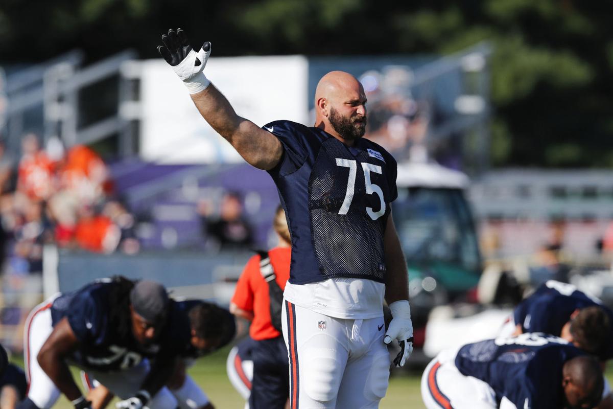 Chicago Bears offensive guard Kyle Long stretches at training camp in Bourbonnais, Ill. on Aug. 2, 2019. Long announced Sunday on Twitter that he has retired.