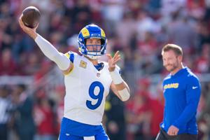 November 9, 2025; Santa Clara, California, USA; Los Angeles Rams quarterback Matthew Stafford (9) warms up in front of head coach Sean McVay (right) before the game against the San Francisco 49ers at Levi's Stadium. Mandatory Credit: Kyle Terada-Imag