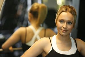 "Heroes" star Hayden Panettiere, who plays an energetic cheerleader on the NBC superhero drama series, works out with her trainer Jonathan Beran, at West Hollywood gym Crunch in April 2007.