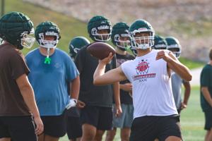 High school football practice kicks off