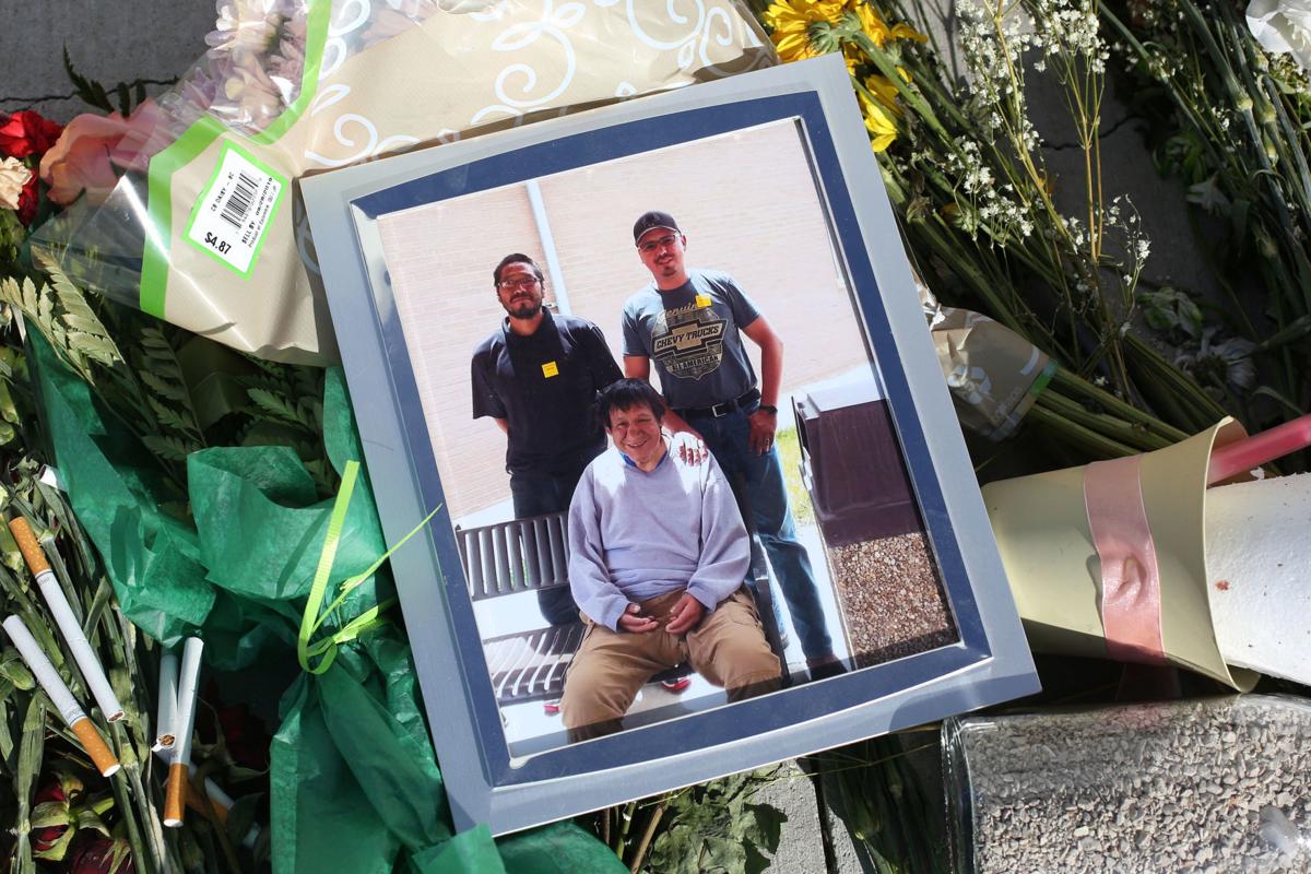Vigil for man killed in police shooting