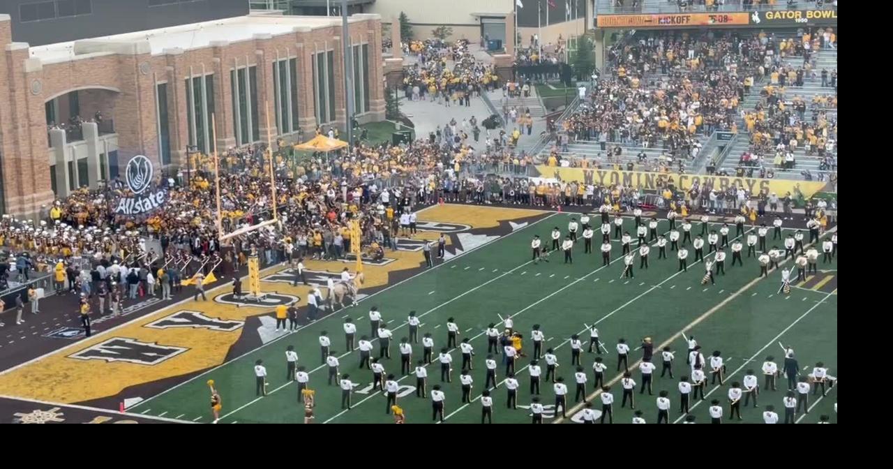 The Wyoming Cowboys take the field prior to their game against Northern Colorado on Saturday.