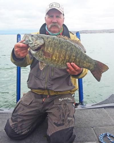 Western Montana angler lands 7.5 pound smallmouth that could be new state  record