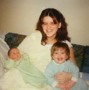 Susan Vesey is pictured with her two young children not long before she was brutally raped and murdered in her home in 1980.