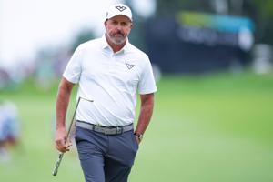 Phil Mickelson of HyFlyers GC walks on the first green during the semifinals of the LIV Golf Michigan Team Championship at The Cardinal at Saint John's Resort in Detroit on Aug. 23, 2025.