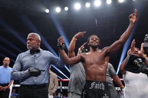 Keyshawn Davis has his hand raised after a unanimous decision win over Nahir Albright in their rematch at Scope Arena in Norfolk, Virginia on May 16, 2026.