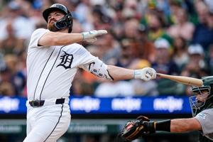 Detroit Tigers catcher Jake Rogers (34) bats against the Athletics during the second inning at Comerica Park in Detroit on