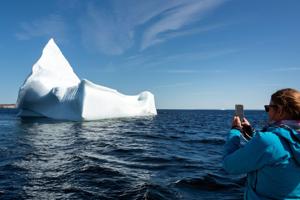Icebergs drift to east Canada from Greenland. Tourists can see them by boat.