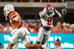 Ohio State Buckeyes safety Jaylen McClain (8) reacts to a missed interception during the NCAA football game against the Texas Longhorns at Darrell K Royal–Texas Memorial Stadium in Austin, Texas on Sept. 12, 2026. Texas won 24-23.