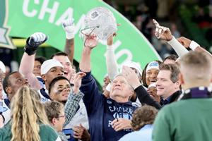 Aug 29, 2026; Dublin, Co. Dublin, IRL;  North Carolina Tar Heels head coach Bill Belichick celebrates with the Coach's Award after the game at Aviva Stadium.  Mandatory Credit: Laszlo Geczo-Imagn Images