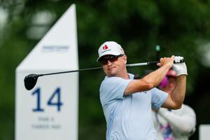 Zach Johnson follows through on his drive off hole No. 14 during round 3 of the Kaulig Companies PGA Championship, July 11,