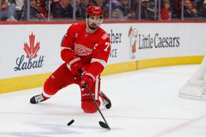 Detroit Red Wings center Dylan Larkin (71) skates with the puck in the first period against the Columbus Blue Jackets at Little Caesars Arena.