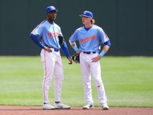 Knoxville Smokies infielders Ed Howard (9) and Karson Simas (1) talk during a pause in the Minor League against the Birmingham Barons on April 5, 2026, in Knoxville, Tennessee.