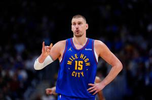 Apr 20, 2026; Denver, Colorado, USA; Denver Nuggets center Nikola Jokic (15) reacts towards the bench in the second half against the Minnesota Timberwolves during game two of the first round of the 2026 NBA Playoffs at Ball Arena. Mandatory Credit: R