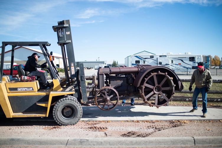 The return of "Big Red" Tractor installed along Gurley Avenue in Gillette