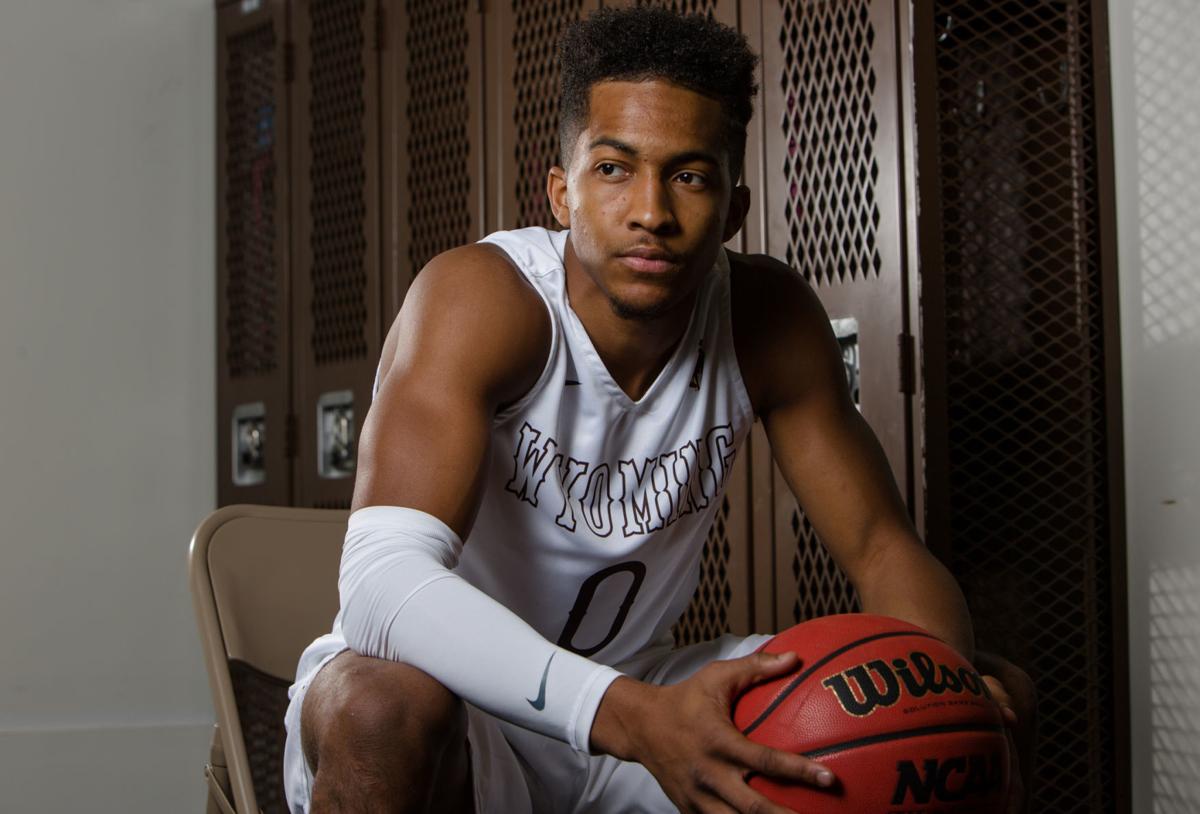 Woman Says Suspended Uw Basketball Player Ny Redding Knocked Her