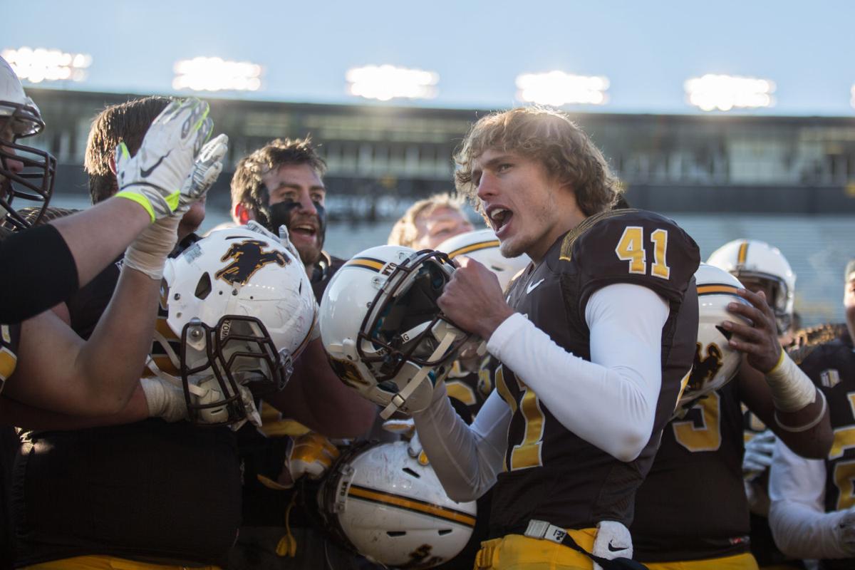 Notebook Punter Ethan Wood trying out flop technique Football