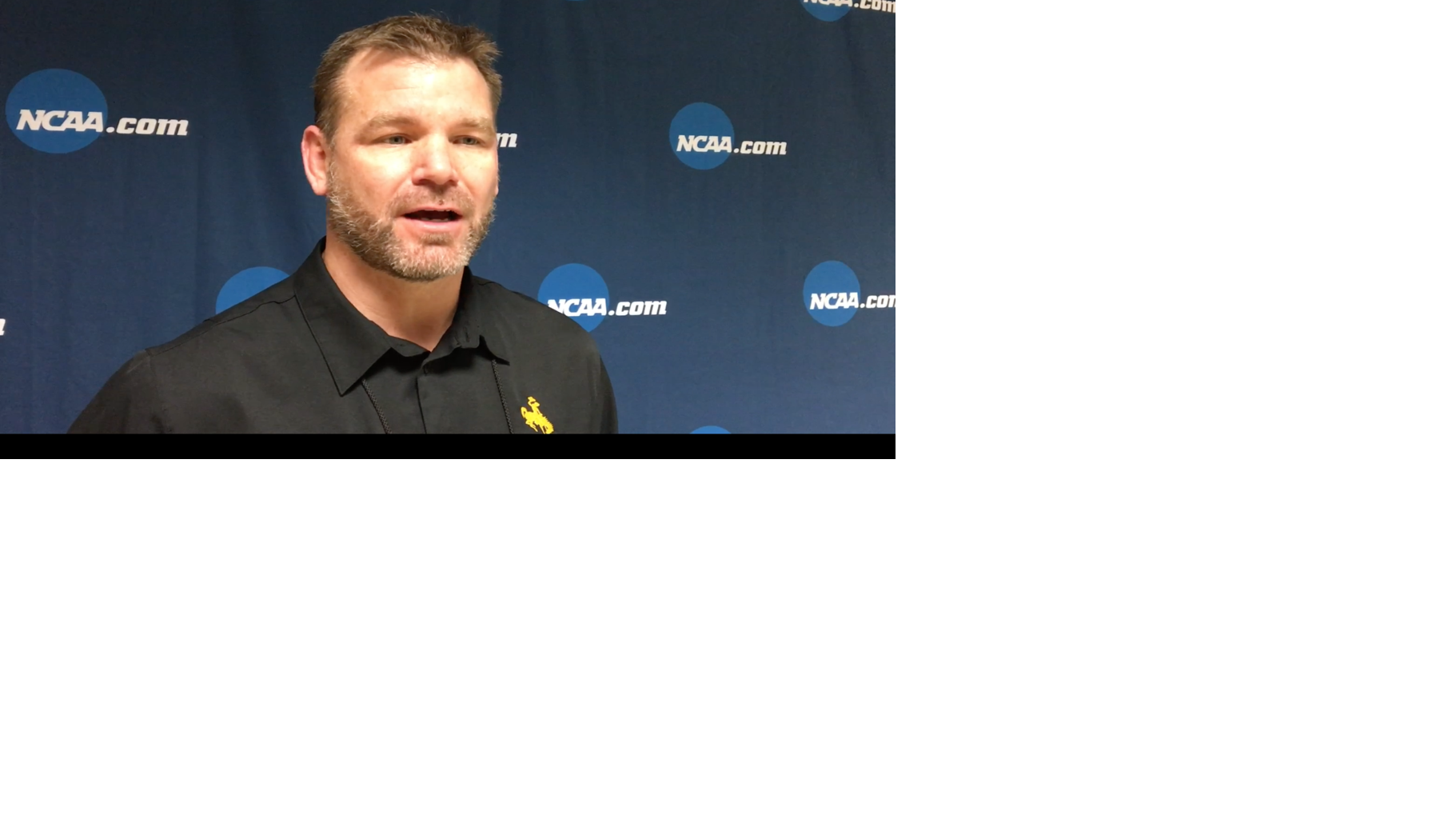 Wyoming wrestling coach Mark Branch speaks after Day 1 at nationals