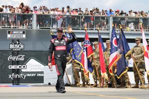 Driver Kyle Busch is introduced ahead of the NASCAR Cup Series race at Pocono Raceway on Sunday, July 23, 2023. Busch won the