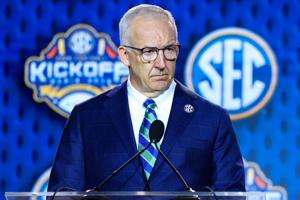SEC Commissioner Greg Sankey speaks to the press during SEC Football Kickoff Media Day at the Tampa Marriott.