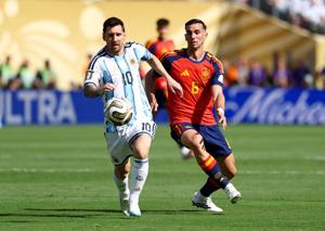 Spain battles past 10-man Argentina 1-0 in extra time to win World Cup