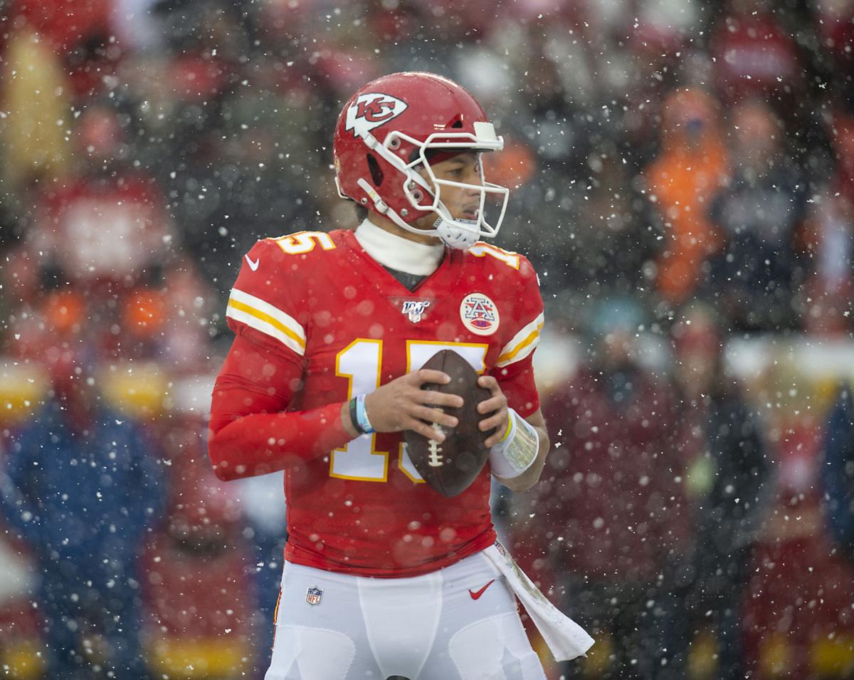 Kansas City Chiefs quarterback Patrick Mahomes looks for a receiver downfield in the second quarter while playing the Denver Broncos Sunday, Dec. 15, 2019 at Arrowhead Stadium in Kansas City, Mo.