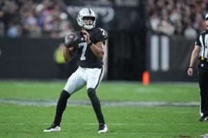 Las Vegas Raiders quarterback Geno Smith (7) looks to throw in the third quarter against the New York Giants at Allegiant Stadium in Paradise, Nevada on Dec. 28, 2025.