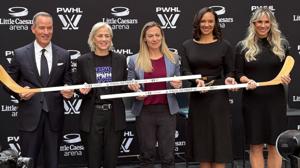 From left to right, Chris Ilitch (Ilitch Sports + Entertainment), Amy Scheer (PWHL), Jayna Hefford (PWHL), Mary Sheffield (Mayor) and Bridget Sponsky (Ally) on stage at the PWHL's press conference on Wednesday.