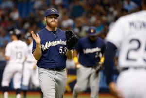 Aug 4, 2017; St. Petersburg, FL, USA; Milwaukee Brewers starting pitcher Brandon Woodruff (53) reacts as he walks back to the dugout as he left bases loaded during the first inning against the Tampa Bay Rays at Tropicana Field. Mandatory Credit: Kim 