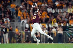 Arizona State Sun Devils wide receiver Jordyn Tyson (0) catches a pass against the UCF Knights during the second half at Mountain America Stadium in Tempe on Nov. 9, 2024.