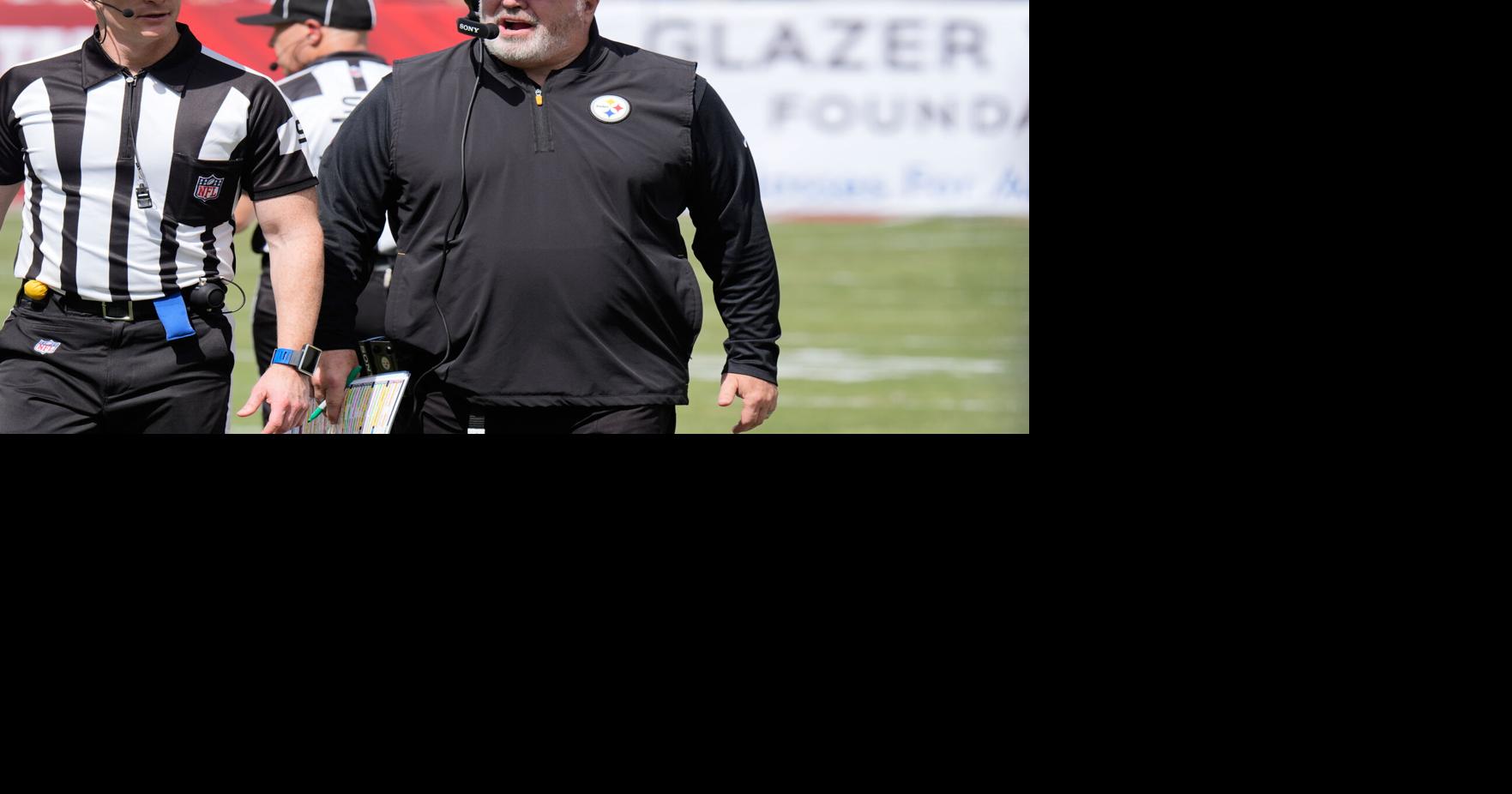 Steelers coach Mike McCarthy limps into injury tent at halftime of ...