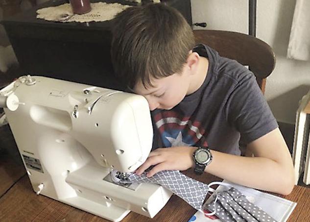 Wallpaper Helping Hands Residents Stitching Hundreds Of Masks For Family For Android Free