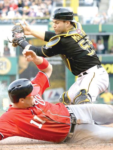 McCutchen's sacrifice fly lifts Pirates to 5-4 win, extends