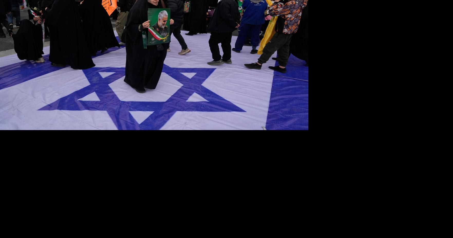 Iran commemorates 1979 revolution as nation is squeezed by anger over crackdown, tensions with US