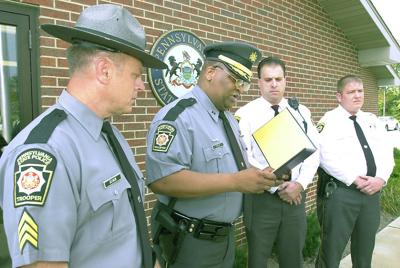 State Police Recognize Two For Apprehending Bank Robber News