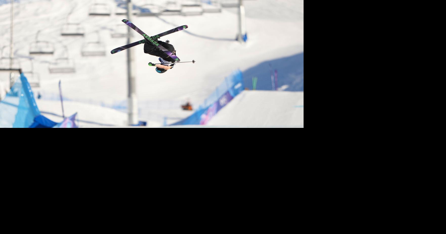 Olympic slopestyler shows some skin, skis down the mountain in tank top