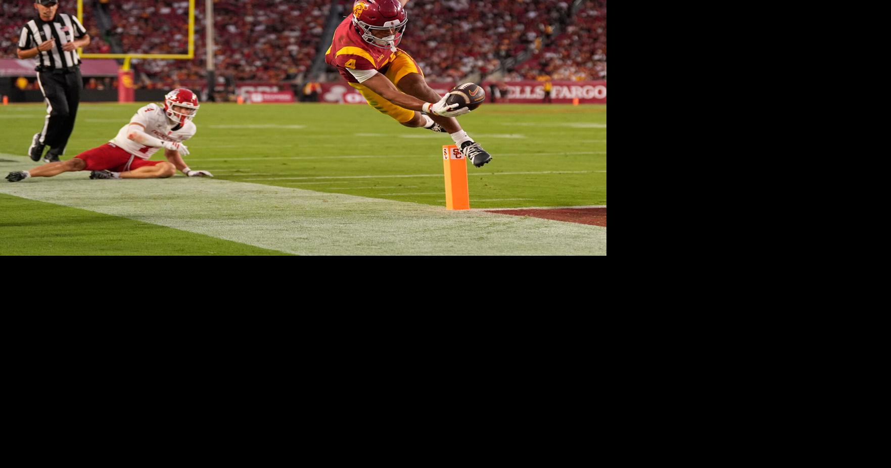 Maiava passes for 349 yards, hits frosh Mosley for 2 TDs in No. 14 Southern California's 39-0 rout of Fresno State