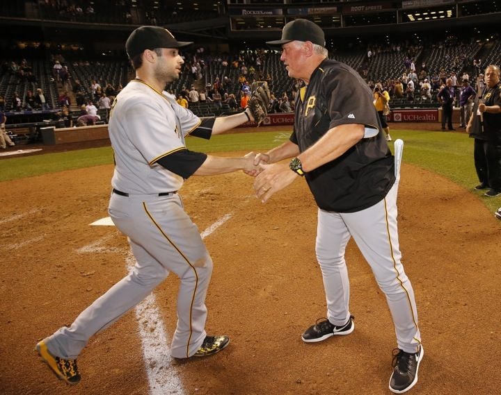 Pittsburgh Pirates manager Clint Hurdle shows the All-Star jersey