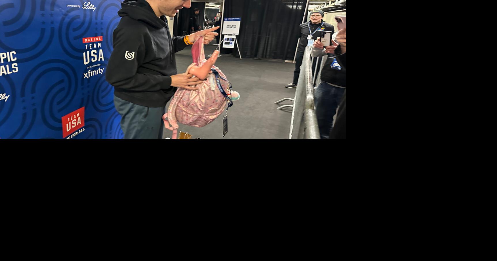 A pink backpack and an odd phone case are U.S. speedskating's fantasy football punishments