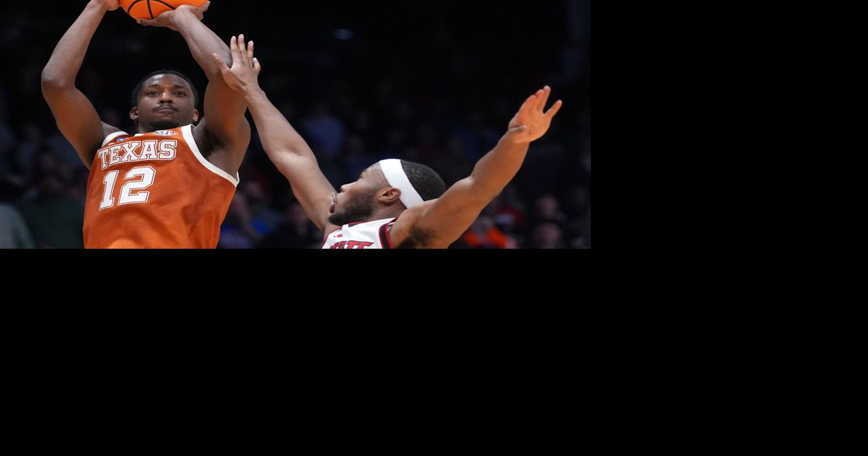 Tramon Mark's late jumper gives Texas a 68-66 win over North Carolina State in the First Four